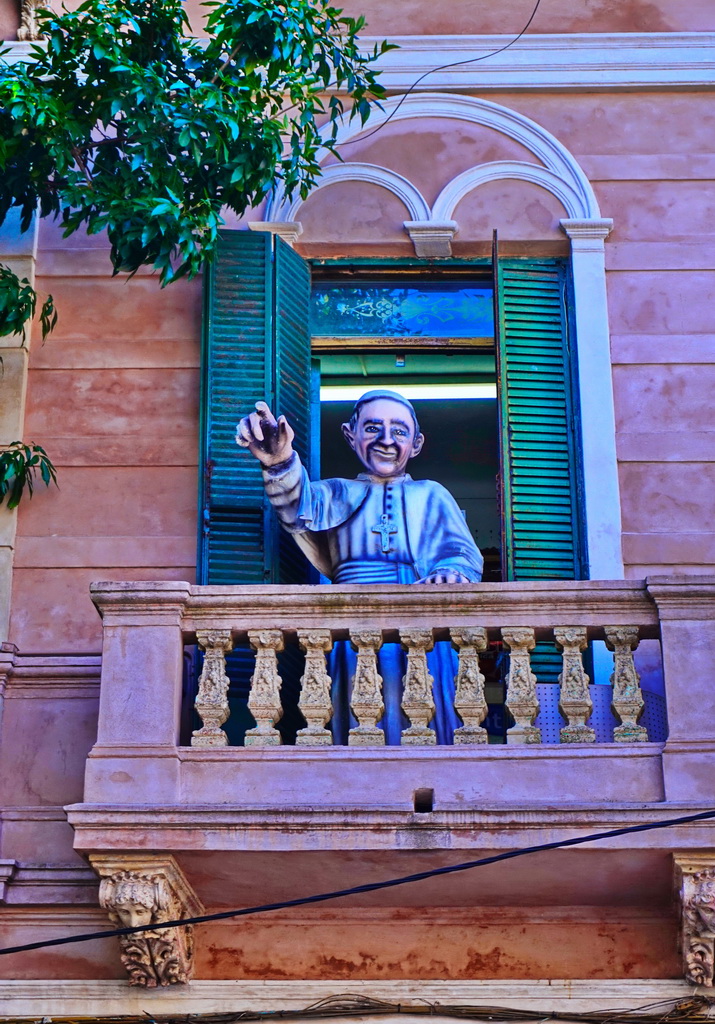 Ляльки на фасадах в районі Ла-Бока в Буенос-Айресі
